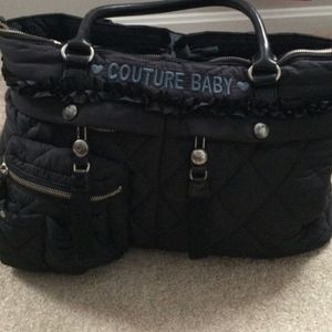 Juicy diaper bag with changing pad